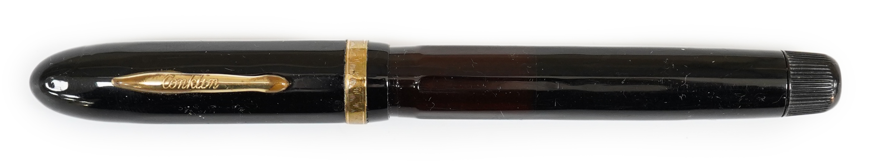 A Conklin nozac with clear barrel word gauge fitted with 14ct. gold Conklin nib